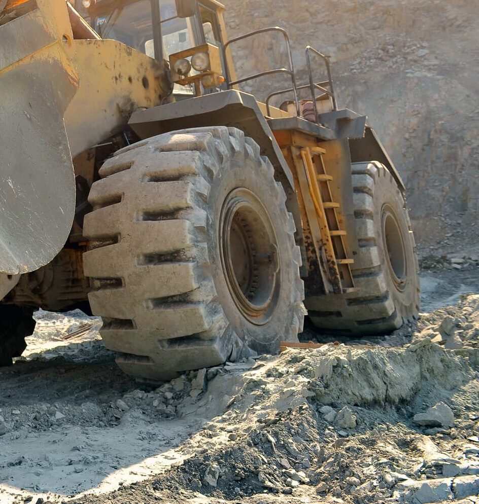 An earthmover at a constructions site equipped with a construction wheel system - WSD Wheel Systems